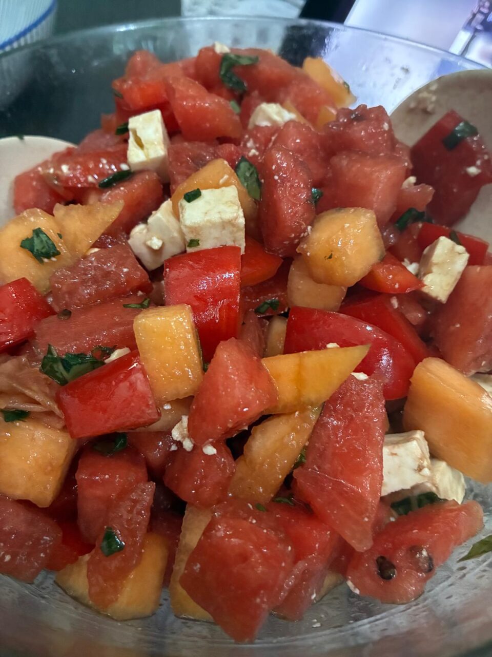 "Fresh fruit salad with Feta cheese and Basil"